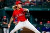 Texas Rangers starting pitcher Mike Foltynewicz throws during the first inning of the team's baseball game against the Baltimore Orioles in Arlington, Texas, Friday, April 16, 2021. (AP Photo/Roger Steinman)