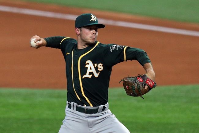Oakland Athletics starting pitcher Daulton Jeffries works the first inning against the Texas Rangers in a baseball game Saturday, Sept. 12, 2020 in Arlington, Texas. (AP Photo/Richard W. Rodriguez)