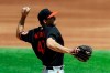 Baltimore Orioles starting pitcher John Means delivers a pitch against the Texas Rangers in the third inning during a baseball game on Sunday, April 18, 2021, in Dallas. (AP Photo/Richard W. Rodriguez)