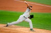 Oakland Athletics starting pitcher Frankie Montas throws in the first inning of a baseball game against the Texas Rangers in Arlington, Tex, Sunday, Sept. 13, 2020. (AP Photo/Matt Strasen)