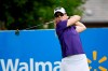 Austin Ernst watches her shot on the first tee during the final round of the LPGA Walmart NW Arkansas Championship golf tournament, Sunday, Aug. 30, 2020, in Rogers, Ark. (AP Photo/Michael Woods)