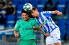 Real Madrid's James Rodriguez, left, vies for the ball with Real Sociedad's Nacho Monreal during the Spanish La Liga soccer match betweenReal Sociedad and Real Madrid at Anoeta stadium, San Sebastian, Spain, Sunday, June 21, 2020. (AP Photo/Alvaro Barrientos)