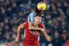 Lazio's Francesco Acerbi, back, vies for the ball with Roma's Edin Dzeko during the Italian Serie A soccer match between Roma and Lazio at Rome's Olympic Stadium, Sunday, Jan. 26, 2020. (AP Photo/Gregorio Borgia)
