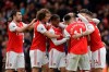 Arsenal's players celebrate a goal during the Premier League soccer match between Arsenal and West Ham at the Emirates Stadium in London, Saturday, March 7, 2020.(AP Photo/Matt Dunham)