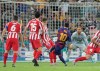 Barcelona's Lionel Messi scores his side first goal during the Spanish Super Cup semifinal soccer match between Barcelona and Atletico Madrid at King Abdullah stadium in Jiddah, Saudi Arabia, Thursday, Jan. 9, 2020. (AP Photo/Hassan Ammar)