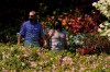 Patrons walk along the sixth hole during a practice round for the Masters golf tournament on Tuesday, April 6, 2021, in Augusta, Ga. (AP Photo/Matt Slocum)