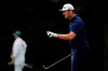 Jon Rahm, of Spain, holds up his ball after putting on the 15th hole during a practice round for the Masters golf tournament Tuesday, Nov. 10, 2020, in Augusta, Ga. (AP Photo/Matt Slocum)