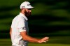 Dustin Johnson waves after putting on the 10th hole during the third round of the Masters golf tournament Saturday, Nov. 14, 2020, in Augusta, Ga. (AP Photo/Chris Carlson)
