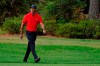 Tiger Woods walks up the 17th fairway during the final round of the Masters golf tournament Sunday, Nov. 15, 2020, in Augusta, Ga. (AP Photo/Matt Slocum)