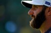 Dustin Johnson watches his tee shot on the 17th hole during the final round of the Masters golf tournament Sunday, Nov. 15, 2020, in Augusta, Ga. (AP Photo/Charlie Riedel)