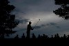 Dustin Johnson watches his tee shot on the 18th tee during the second round of the Masters golf tournament on Friday, April 9, 2021, in Augusta, Ga. (AP Photo/Charlie Riedel)