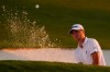 Justin Thomas watches his bunker shot at the 18th hole during the third round of the Masters golf tournament Saturday, Nov. 14, 2020, in Augusta, Ga. (AP Photo/Chris Carlson)