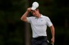 Rory McIlroy, of Northern Ireland, takes off his cap after putting on the 18th green during the second round of the Masters golf tournament on Friday, April 9, 2021, in Augusta, Ga. (AP Photo/David J. Phillip)
