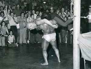 WINNIPEG FREE PRESS FILES
Chief Maivia gives Baron von Raschke a rough ride as action spreads outside the ring in August 1974.