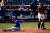 Chicago Cubs' Anthony Rizzo, left, reacts after being tagged out by San Francisco Giants catcher Buster Posey, right, at home plate during the fourth inning of a spring training baseball game Wednesday, March 10, 2021, in Scottsdale, Ariz. (AP Photo/Ashley Landis)