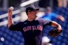 Cleveland Indians pitcher Adam Plutko throws during the first inning of a spring training baseball game against the Seattle Mariners Tuesday, March 2, 2021, in Peoria, Ariz. (AP Photo/Charlie Riedel)