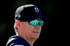 Seattle Mariners manager Scott Servais watches spring training baseball practice Thursday, Feb. 13, 2020, in Peoria, Ariz. (AP Photo/Charlie Riedel)