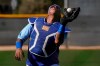 Kansas City Royals' Salvador Perez catches a ball during spring training baseball practice Wednesday, Feb. 24, 2021, in Surprise, Ariz. (AP Photo/Charlie Riedel)