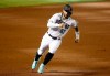 Arizona Diamondbacks' Christian Walker rounds third base against the Oakland Athletics' during the second inning of a baseball game Tuesday, Aug. 18, 2020, in Phoenix. (AP Photo/Darryl Webb)