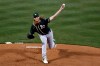 Oakland Athletics starting pitcher A.J. Puk pitches to a Chicago Cubs batter during the first inning of a spring training baseball game Saturday, Feb. 22, 2020, in Mesa, Ariz. (AP Photo/Gregory Bull)