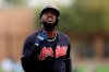 Cleveland Indians' Franmil Reyes points skyward after hitting a home run during the second inning of a spring training baseball game against the Chicago White Sox, Friday, Feb. 28, 2020, in Glendale, Ariz. (AP Photo/Gregory Bull)