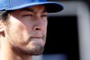 Chicago Cubs starting pitcher Yu Darvish looks on before starting the first inning of a spring training baseball game against the Milwaukee Brewers, Saturday, Feb. 29, 2020, in Mesa, Ariz. (AP Photo/Gregory Bull)