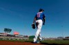 Chicago Cubs starting pitcher Yu Darvish takes the field to start a spring training baseball game against the Milwaukee Brewers, Saturday, Feb. 29, 2020, in Mesa, Ariz. (AP Photo/Gregory Bull)