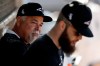 Chicago White Sox manager Rick Renteria, left, talks with pitcher Dallas Keuchel, right, during spring training baseball Saturday, Feb. 15, 2020, in Phoenix. (AP Photo/Gregory Bull)