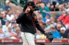 San Francisco Giants pitcher Johnny Cueto reacts after giving up a run against the Chicago Cubs during the second inning of a spring training baseball game Tuesday, March 10, 2020, in Scottsdale, Ariz. (AP Photo/Matt York)