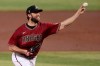 Arizona Diamondbacks pitcher Madison Bumgarner throws during an intrasquad baseball game at practice Tuesday, July 14, 2020, in Phoenix. (AP Photo/Matt York)