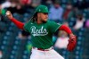 Cincinnati Reds starting pitcher Luis Castillo throws to a Cleveland Indians batter during the first inning of a spring training baseball game Wednesday, March 17, 2021, in Goodyear, Ariz. (AP Photo/Ross D. Franklin)