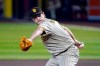 San Diego Padres pitcher Garrett Richards throws against the Arizona Diamondbacks in the first inning during a baseball game, Sunday, Aug 16, 2020, in Phoenix. (AP Photo/Rick Scuteri)