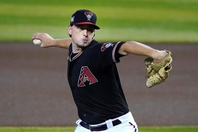 Arizona Diamondbacks pitcher Taylor Clarke throws against the San Francisco Giants in the first inning during a baseball game, Sunday, Aug 30, 2020, in Phoenix. (AP Photo/Rick Scuteri)