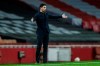 Arsenal's manager Mikel Arteta gestures during the Europa League, round of 16, second leg soccer match between Arsenal and Olympiacos at the Emirates Stadium, in London, Thursday, March 18, 2021. (AP Photo/Matt Dunham)