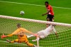 Athletic Bilbao's Inaki Williams kicks the ball during the Spanish La Liga soccer match between Athletic Club and Real Madrid at the San Manes stadium in Bilbao, Spain, Sunday, July 5, 2020. (AP Photo/Alvaro Barrientos)