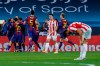 FC Barcelona players celebrate after scoring the opening goal during the Spanish Supercopa final soccer match between FC Barcelona and Athletic Bilbao at La Cartuja stadium in Seville, Spain, Sunday, Jan. 17, 2021. (AP Photo/Miguel Morenatti)