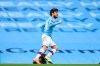 Manchester City's David Silva scores celebrates after scoring the opening goal during the English Premier League soccer match between Manchester City and Bournemouth at the Ethiad Stadium in Manchester, England, Wednesday, July 15, 2020. (Peter Powell/Pool via AP)