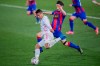Real Madrid's Casemiro, foreground, kicks the ball during the Spanish La Liga soccer match between Real Madrid and Eibar at the Alfredo di Stefano stadium in Madrid, Spain, Saturday, April 3, 2021. (AP Photo/Bernat Armangue)