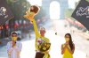 Tour de France winner Slovenia's Tadej Pogacar, wearing the overall leader's yellow jersey, celebrates on the podium after the twenty-first and last stage of the Tour de France cycling race over 108.4 kilometers (67.4 miles) with start in Chatou and finish on the Champs Elysees in Paris, France,Sunday, July 18, 2021. (Garnier Etienne/L'Equipe via AP, Pool)