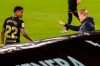 Barcelona's head coach Ronald Koeman, right, talks to Barcelona's Ansu Fati during the Spanish La Liga soccer match between RC Celta and FC Barcelona in Vigo, Spain, Thursday, Oct. 1, 2020. (AP Photo/Lalo R. Villar)