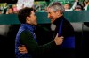 Barcelona's head coach Quique Setien, right, salutes Betis' head coach Rubi during La Liga soccer match between Betis and Barcelona at the Benito Villamarin stadium in Seville, Spain, Sunday, Feb. 9, 2020. (AP Photo/Miguel Morenatti)