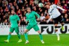 Valencia's Kevin Gameiro, right, heads the ball in front Real Madrid's Gareth Bale, center, Spanish La Liga soccer match between Valencia and Real Madrid at the Mestalla Stadium in Valencia, Spain, Sunday, December 15, 2019. (AP Photo/Alberto Saiz)