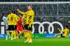 Dortmund players react after receiving the third goal during the German Bundesliga soccer match between Borussia Moenchengladbach and Borussia Dortmund in Moenchengladbach, Germany, Friday, Jan. 22, 2021. (AP Photo/Martin Meissner, Pool)