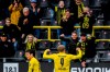 Dortmund's Erling Haaland, right, celebrates after scoring his second goal during the German Bundesliga soccer match between Borussia Dortmund and SC Freiburg in Dortmund, Germany, Saturday, Oct. 3, 2020. (AP Photo/Martin Meissner)
