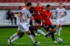 Spain's Rodrigo Moreno, right, runs past Germany player during the UEFA Nations League soccer match at the Mercedes-Benz Arena stadium in Stuttgart, Germany, Thursday, Sept. 3, 2020. (AP Photo/Matthias Schrader)