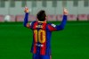 Barcelona's Lionel Messi celebrates after scoring his second goal during the Spanish La Liga soccer match between FC Barcelona and Getafe at the Camp Nou stadium in Barcelona, Spain, Thursday, April 22, 2021. (AP Photo/Joan Monfort)