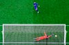 Chelsea's Jorginho scores a penalty shot during the English Premier League soccer match between Tottenham and Chelsea at the Tottenham Hotspur Stadium in London, England, Thursday, Feb. 4, 2021. (Clive Rose/Pool via AP)