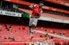 Arsenal's Pierre-Emerick Aubameyang celebrates after scoring the opening goal during the English Premier League soccer match between Arsenal and Norwich City at the Emirates Stadium in London, England, Wednesday, July 1, 2020. (Shaun Botterill/Pool via AP)