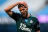 Newcastle's Joelinton grimaces in pain during the English Premier League soccer match between Manchester City and Newcastle at the Ethiad Stadium in Manchester, England, Wednesday, July 8, 2020. (Michael Regan/Pool via AP)