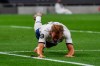 Tottenham's Harry Kane celebrates after scoring his team's second goal during the English Premier League soccer match between Tottenham Hotspur and West Ham at the Tottenham Hotspur stadium in London, England, Tuesday, June 23, 2020. (Neil Hall/Pool via AP)